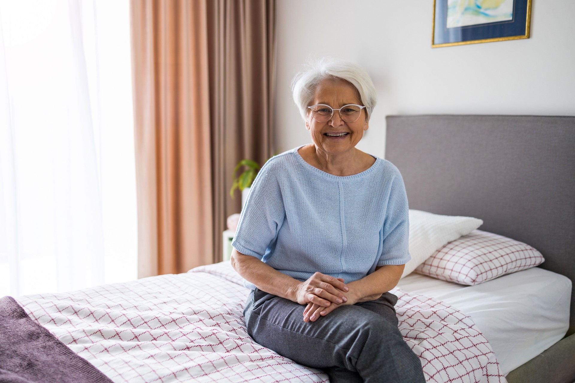 Portrait of senior woman smiling at home